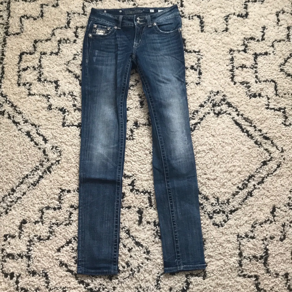 Medium wash Miss Me embellished skinny jeans